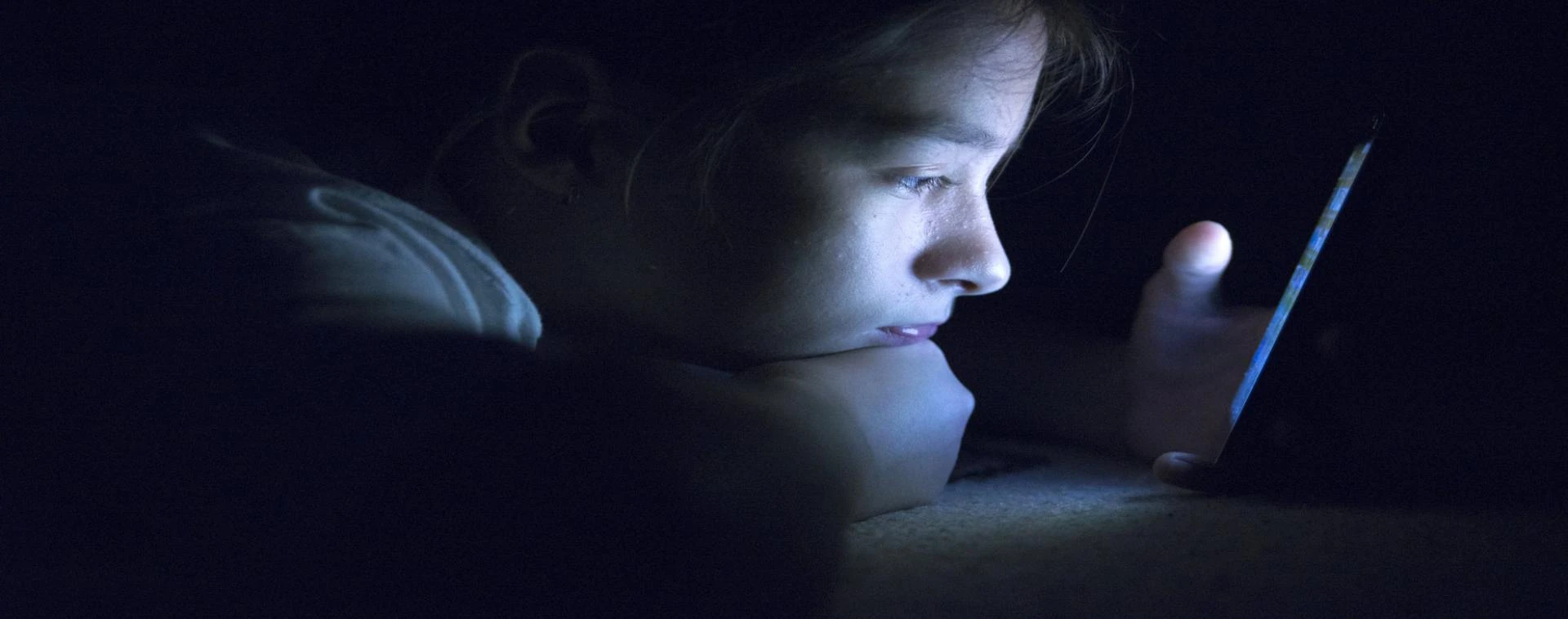 youngster looking at screen